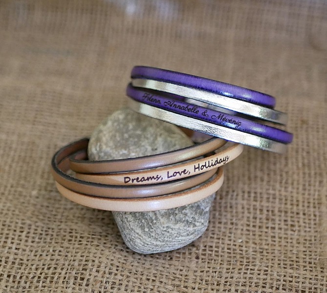 Skinnarmb&aring;nd med dobbel vridning og etnisk magnetl&aring;s for personlig tilpasning