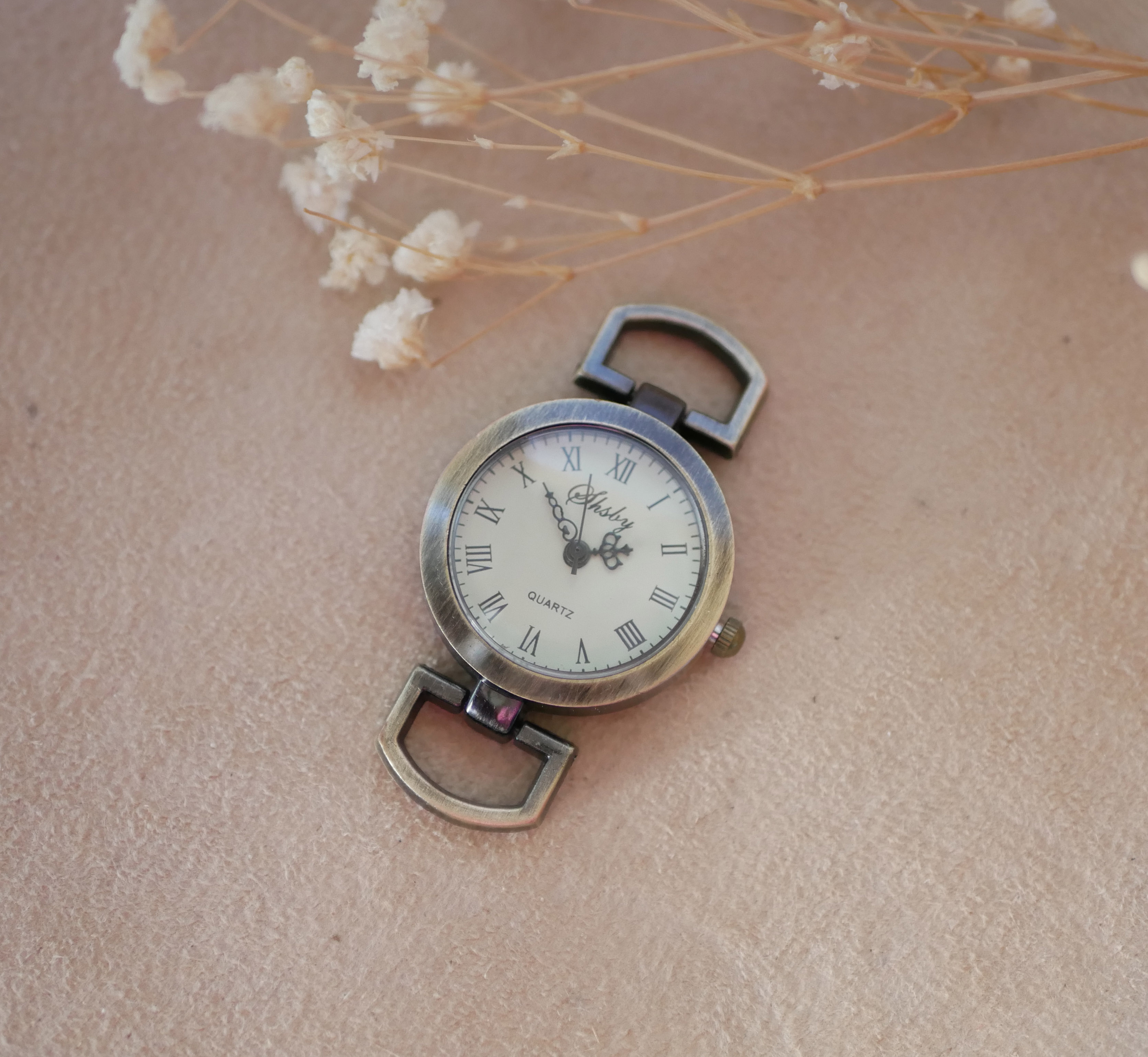 Urskive i bronse med romertall