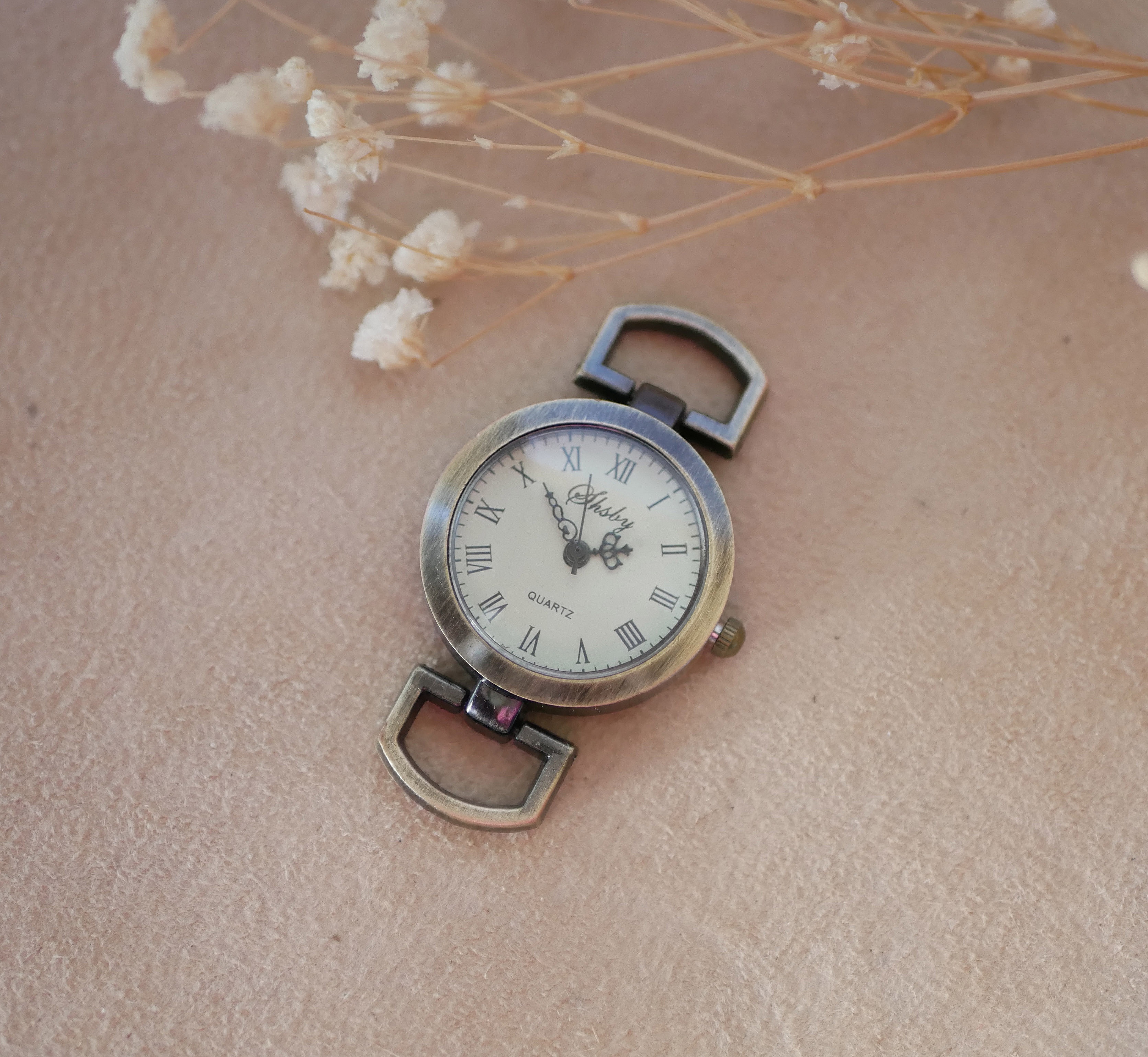 Urskive i bronse med romertall