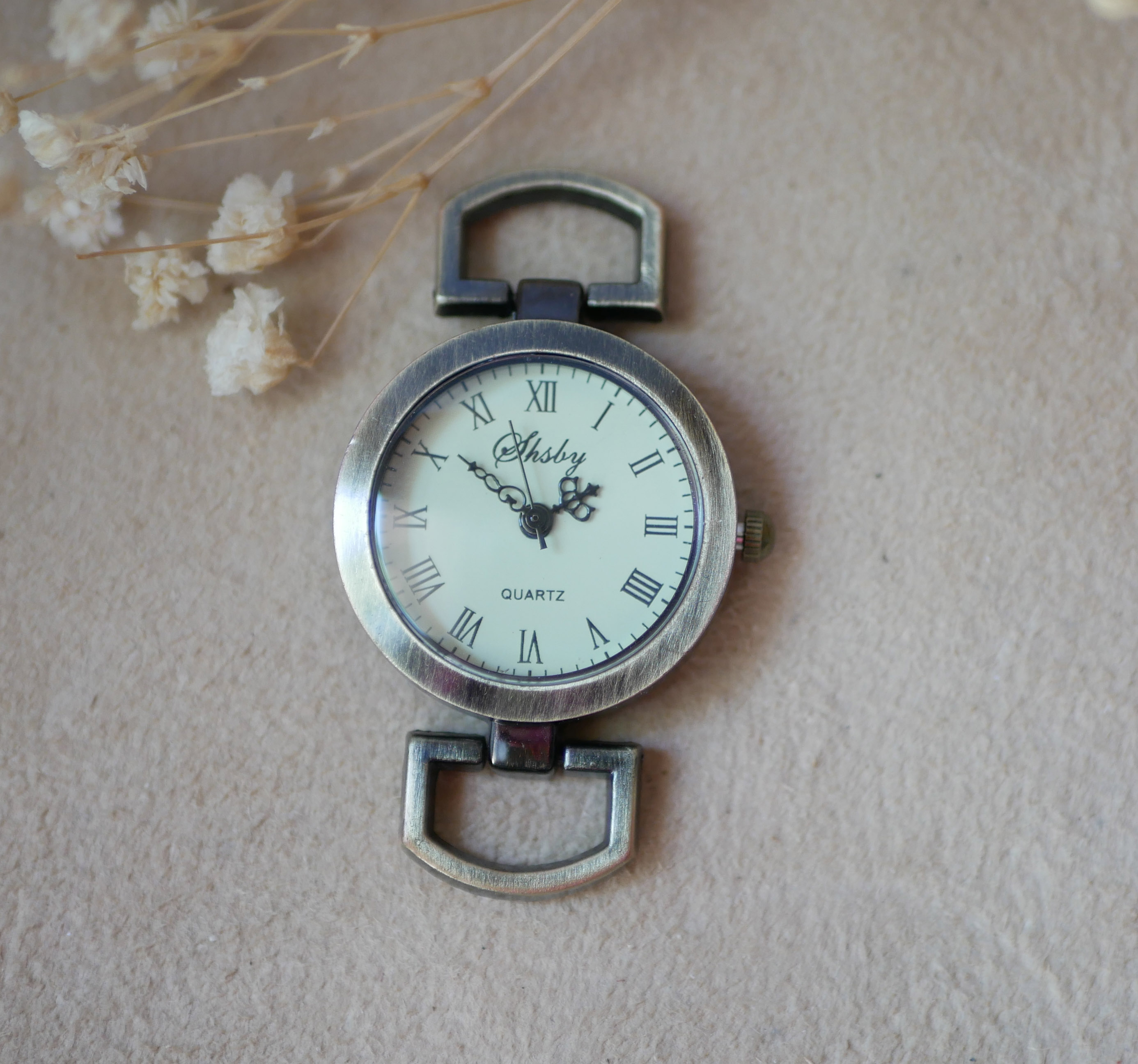 Urskive i bronse med romertall