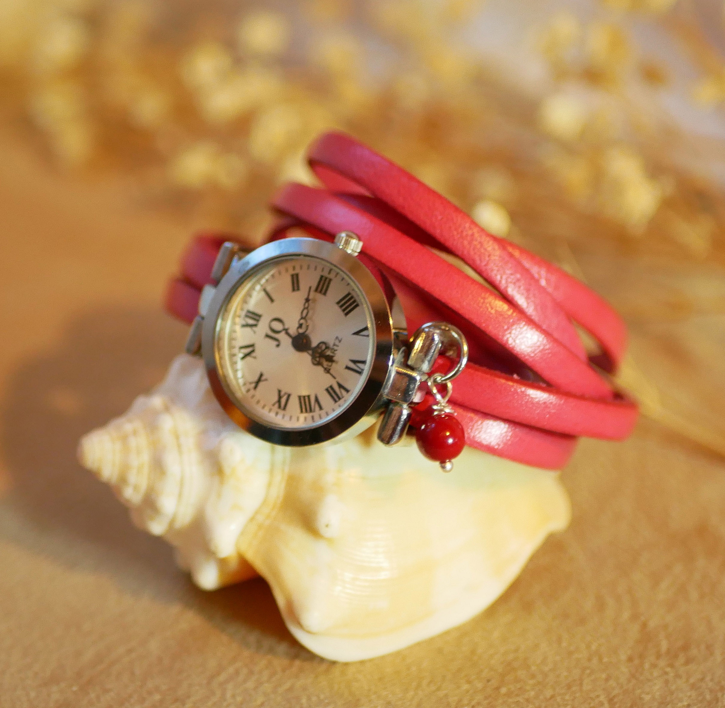 S&oslash;lvfarget l&aelig;rarmb&aring;nd med flere omdreininger og justerbar l&aring;s