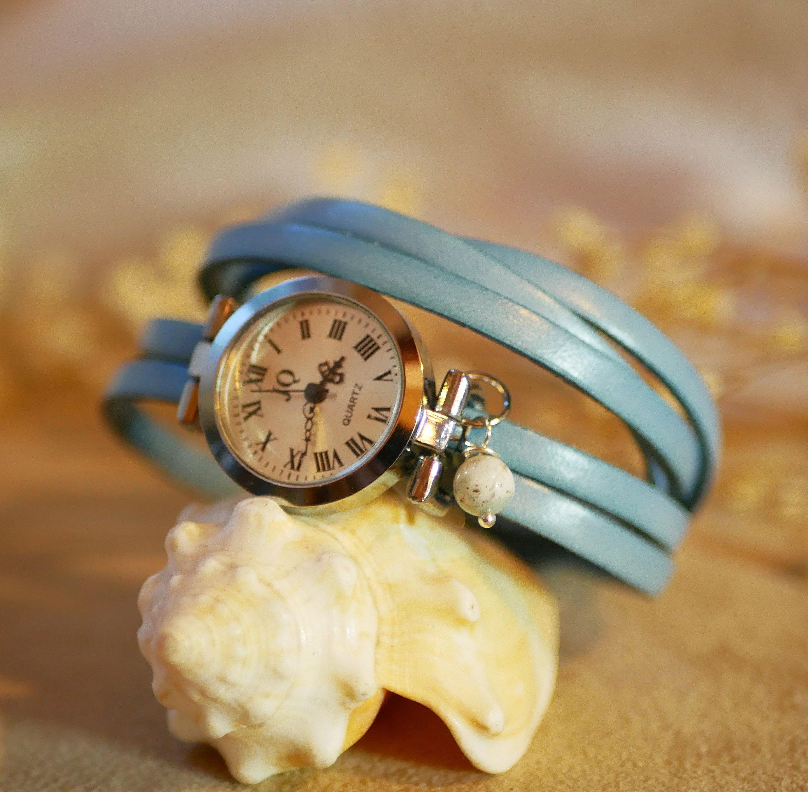 S&oslash;lvfarget l&aelig;rarmb&aring;nd med flere omdreininger og justerbar l&aring;s