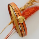 Mansjettarmbånd i gull for kvinne Gull og oransje skjell