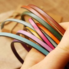 Mansjettarmbånd i et utvalg av 4 skinntyper